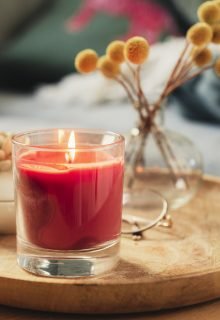 Scented candle burning on sofa table
Photo taken in natural light